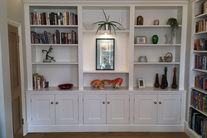 Carpenter-fitted bookshelf units in Weybridge