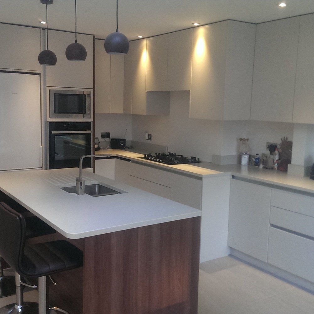 Fitted kitchen units and breakfast island bar in Teddington KT1