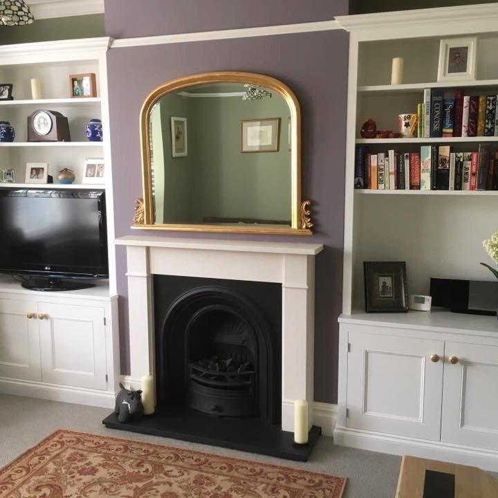 Fitted alcove media and bookshelf units in Whitton